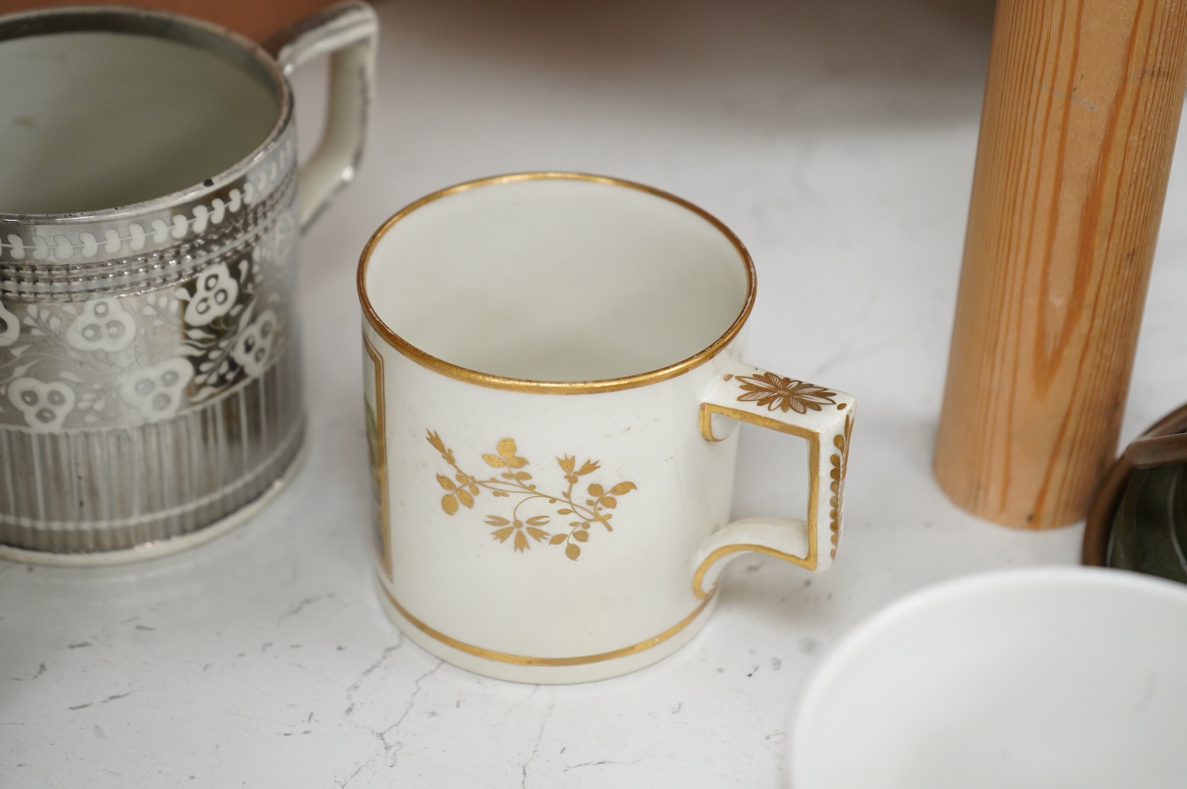 A pair of early 19th century English porcelain large mugs with gilt bands and five other early 19th century porcelain or pearlware mugs, one inscribed SG, Forget Me Not, largest each 14cm high